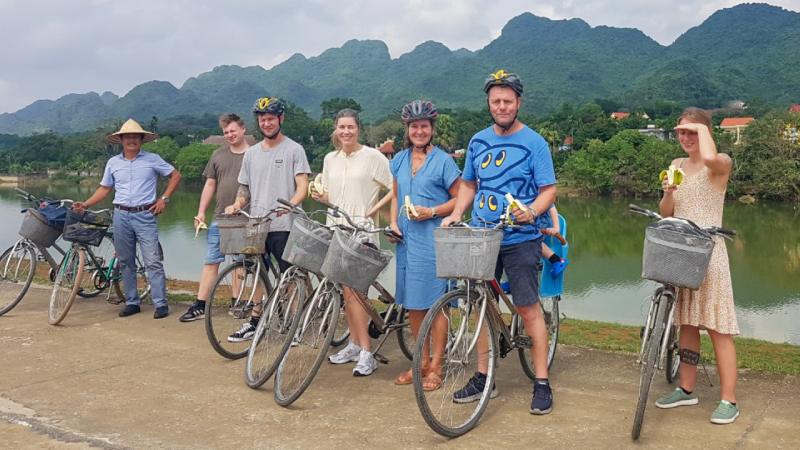 Van Long Cycling, Market Visit, Cooking Class & Boat Trip